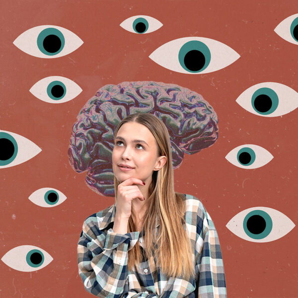Woman looking at a brain surrounded by lots of eyes
