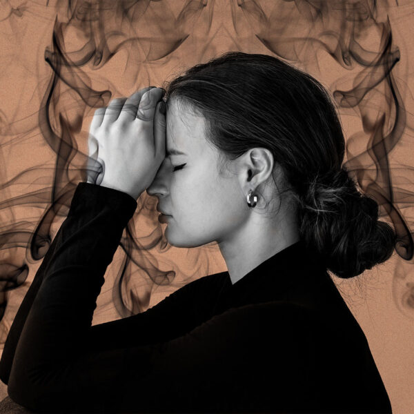 Woman with smoke around her head
